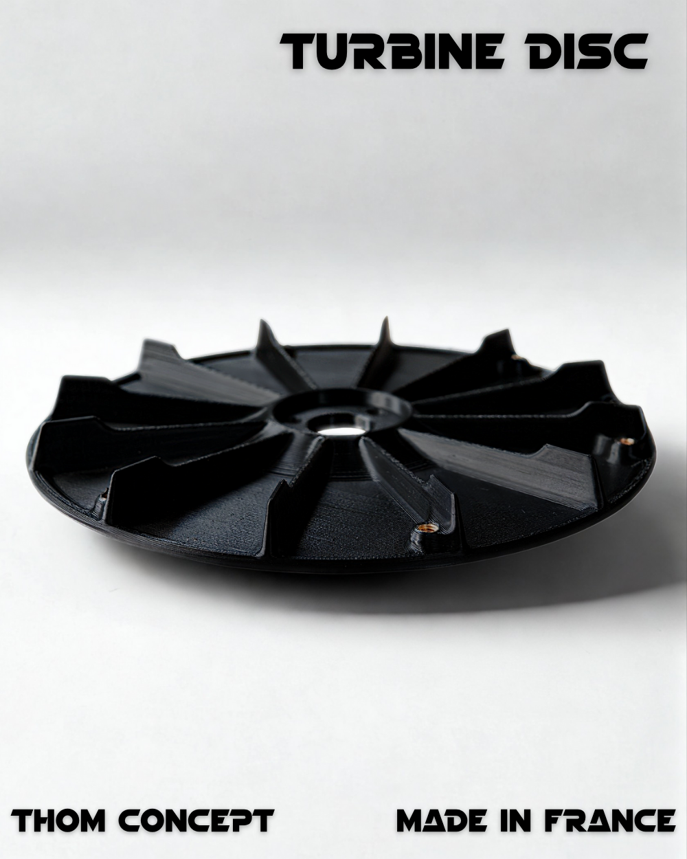 Vue réelle du disque Turbine Disc V2 noir pour robot tondeuse Luba Mini, conception robuste et profil aérodynamique.